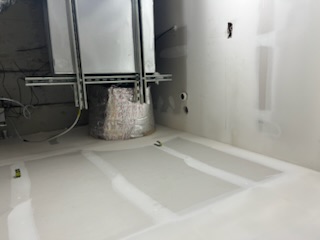 HVAC equipment installation above a ceiling