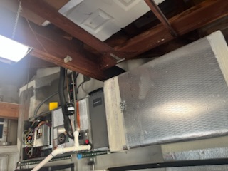 Insulated duct transition above a ceiling